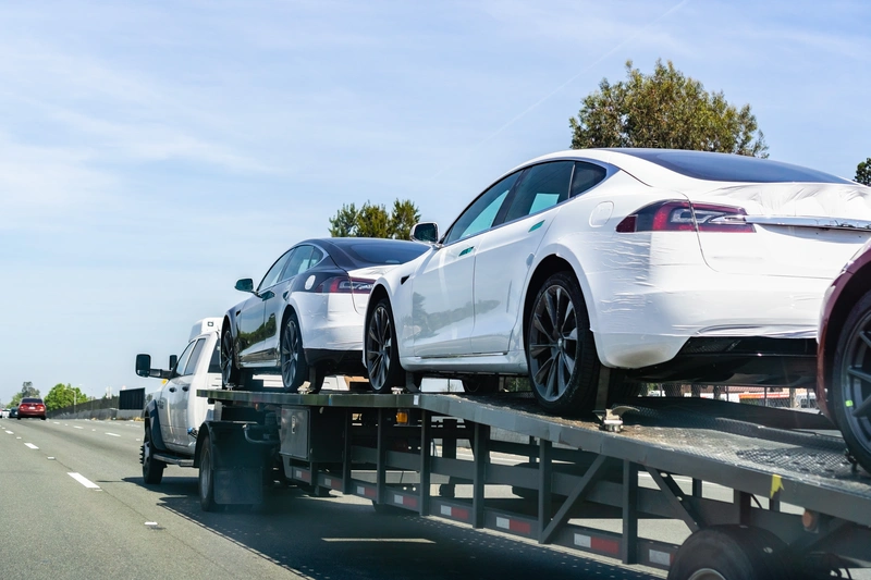 Bulk transport of passenger cars on a car trailer