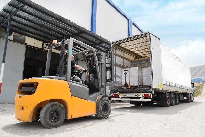 Loading a truck with a forklift