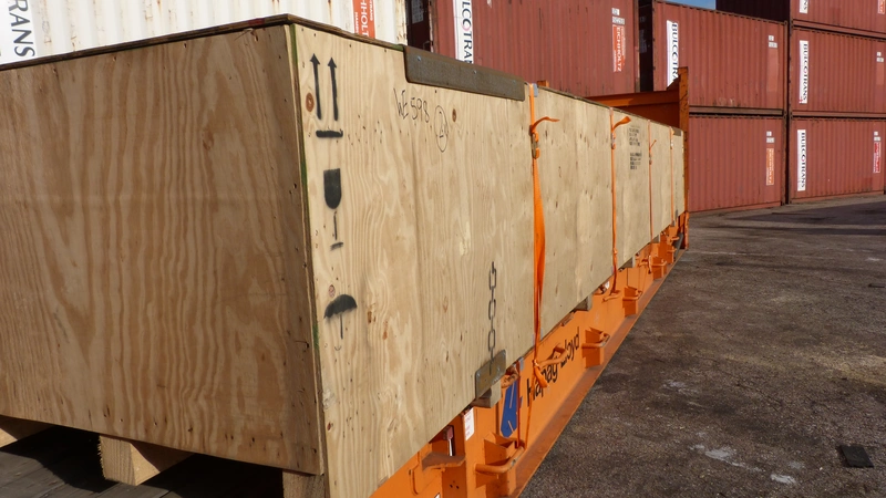 Goods secured on a flat rack with webbing